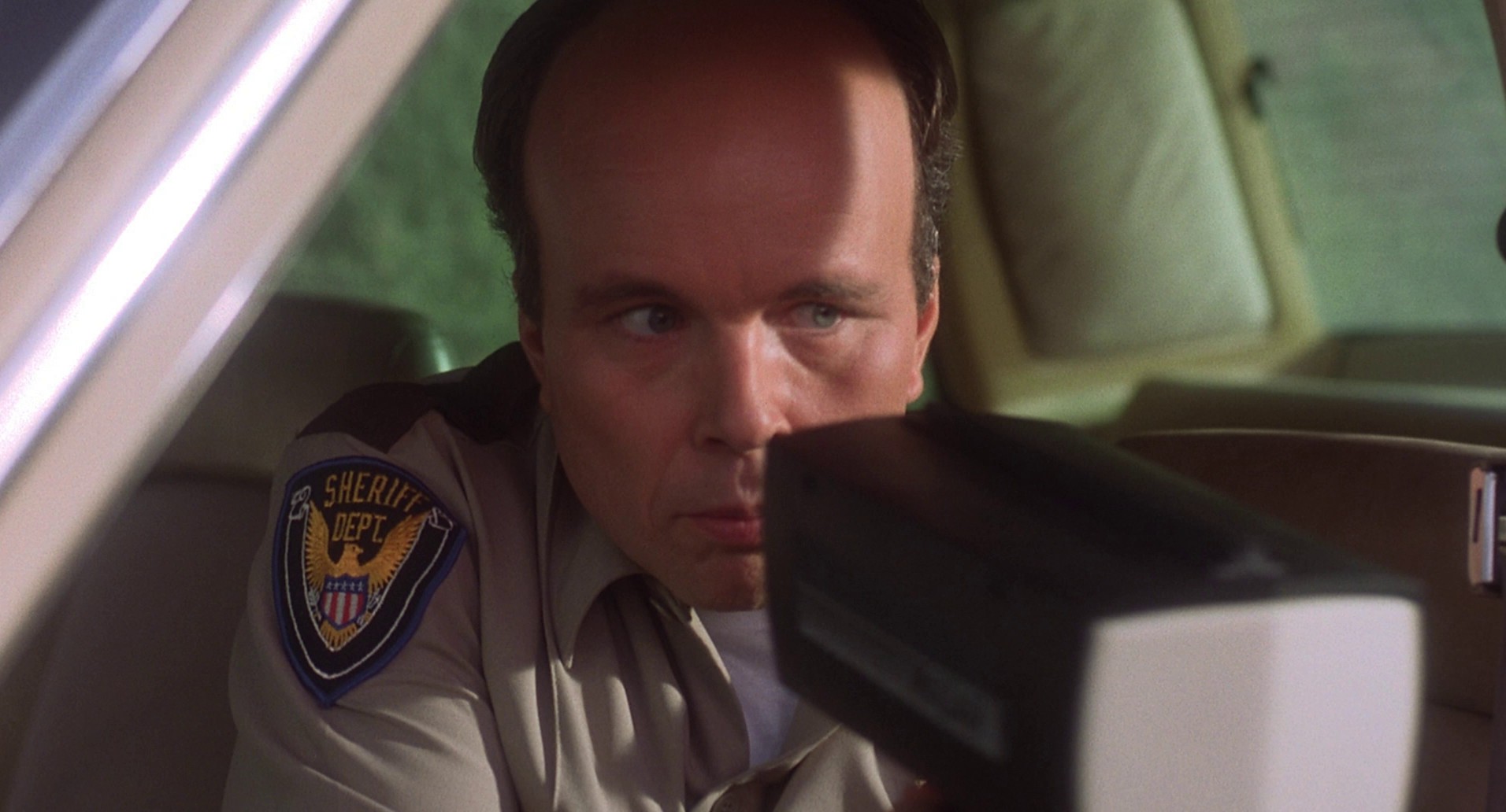 Santa with Muscles (1996) —  shot,  lighting