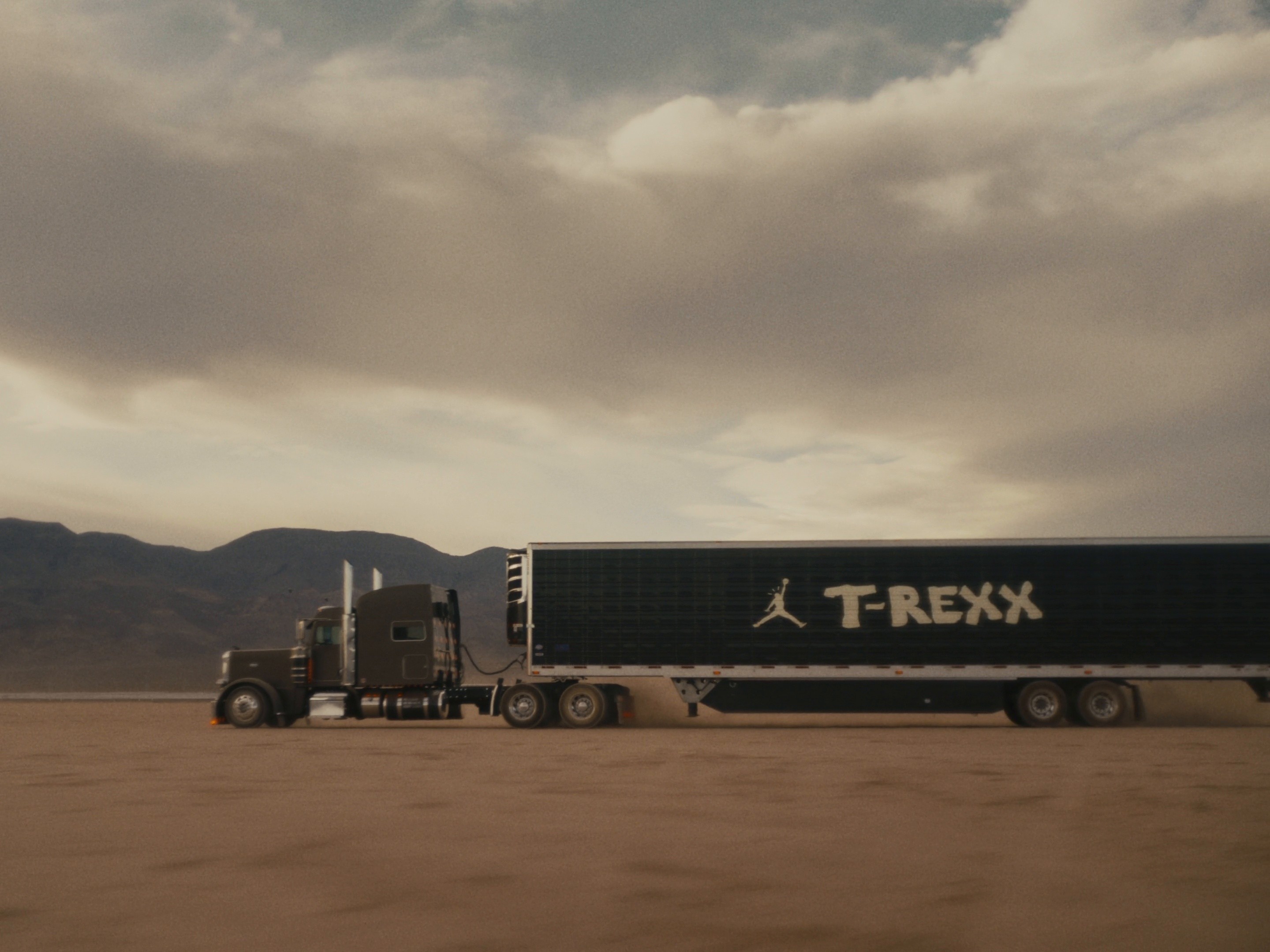 Travis Scott x Jumpman: T-REXX (2024) —  shot,  lighting